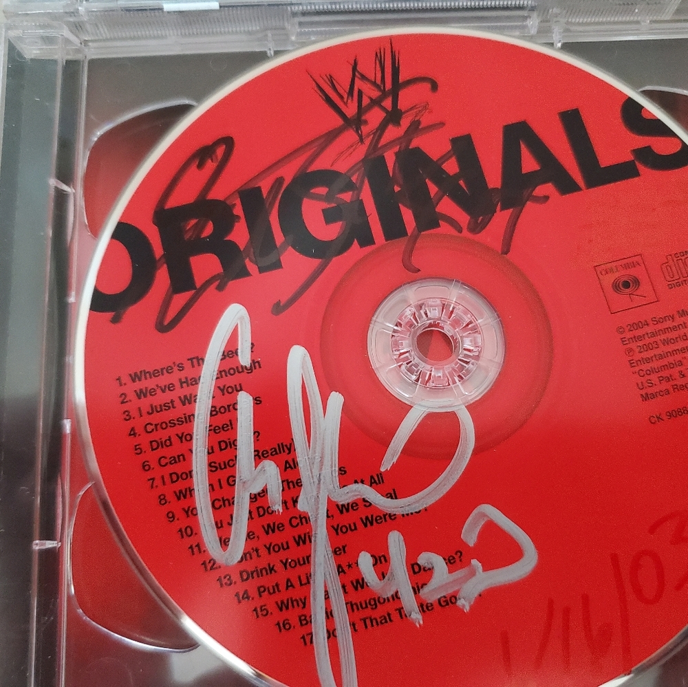 Autographed wwe cd